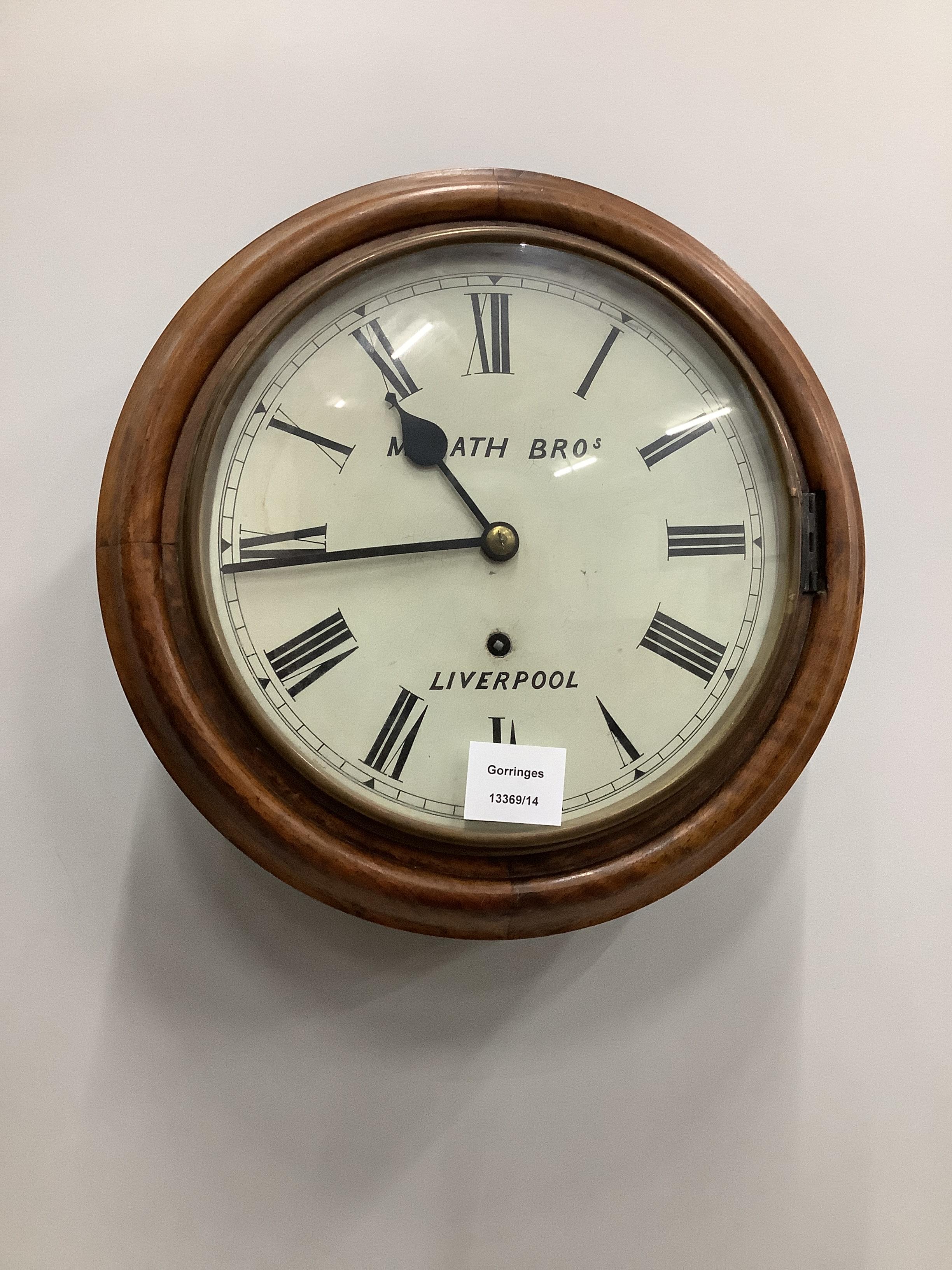 A Victorian mahogany circular wall dial, marked Morath Bros., Liverpool, diameter 32cm